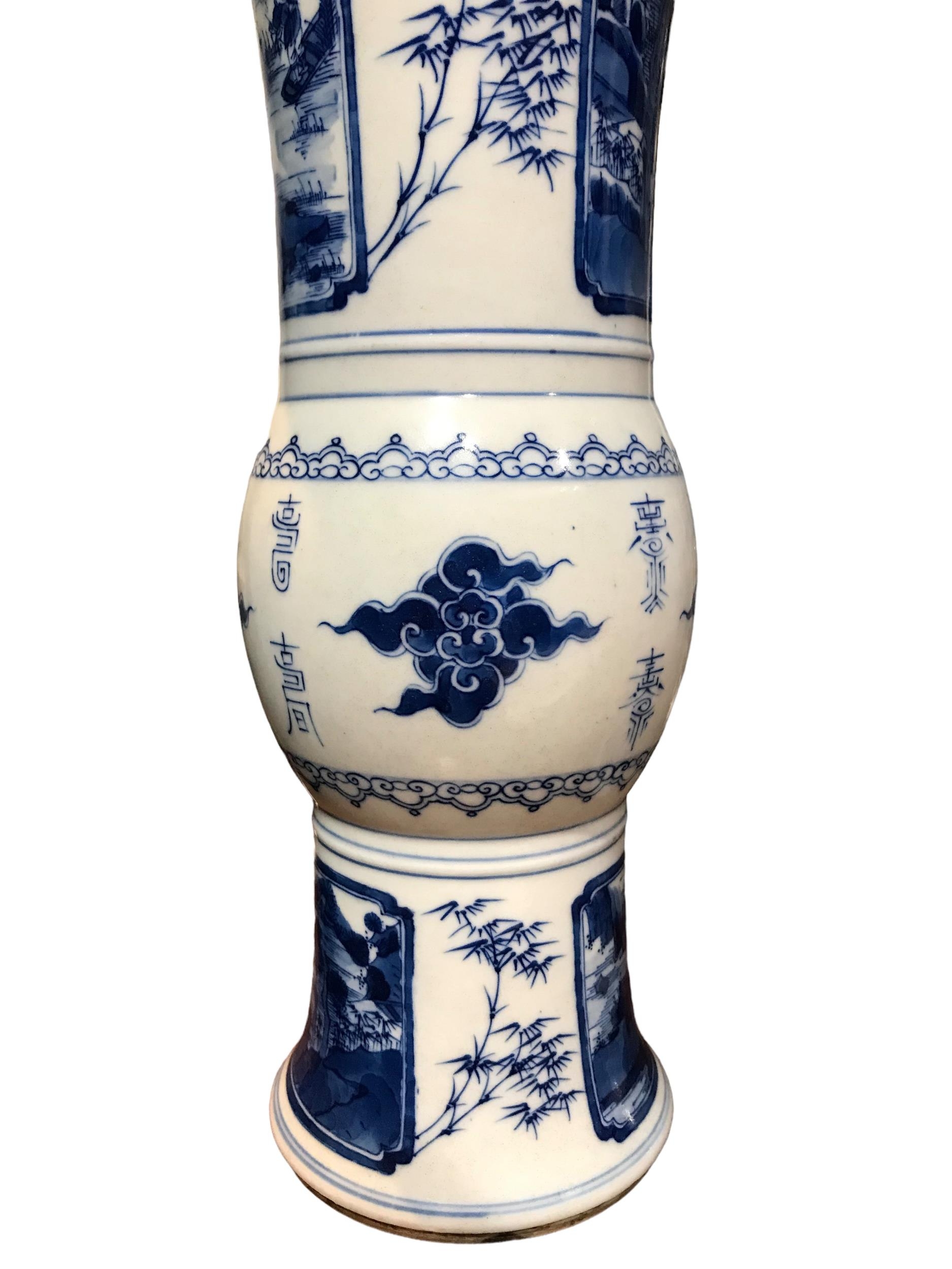 A PAIR OF LATE 19TH EARLY 20TH CENTURY CHINESE BLUE AND WHITE GU BEAKER FORM VASES Decorated with - Image 2 of 3