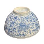 A SMALL 18TH/19TH CENTURY CHINESE BLUE AND WHITE BOWL With deep rounded sides rising from a short