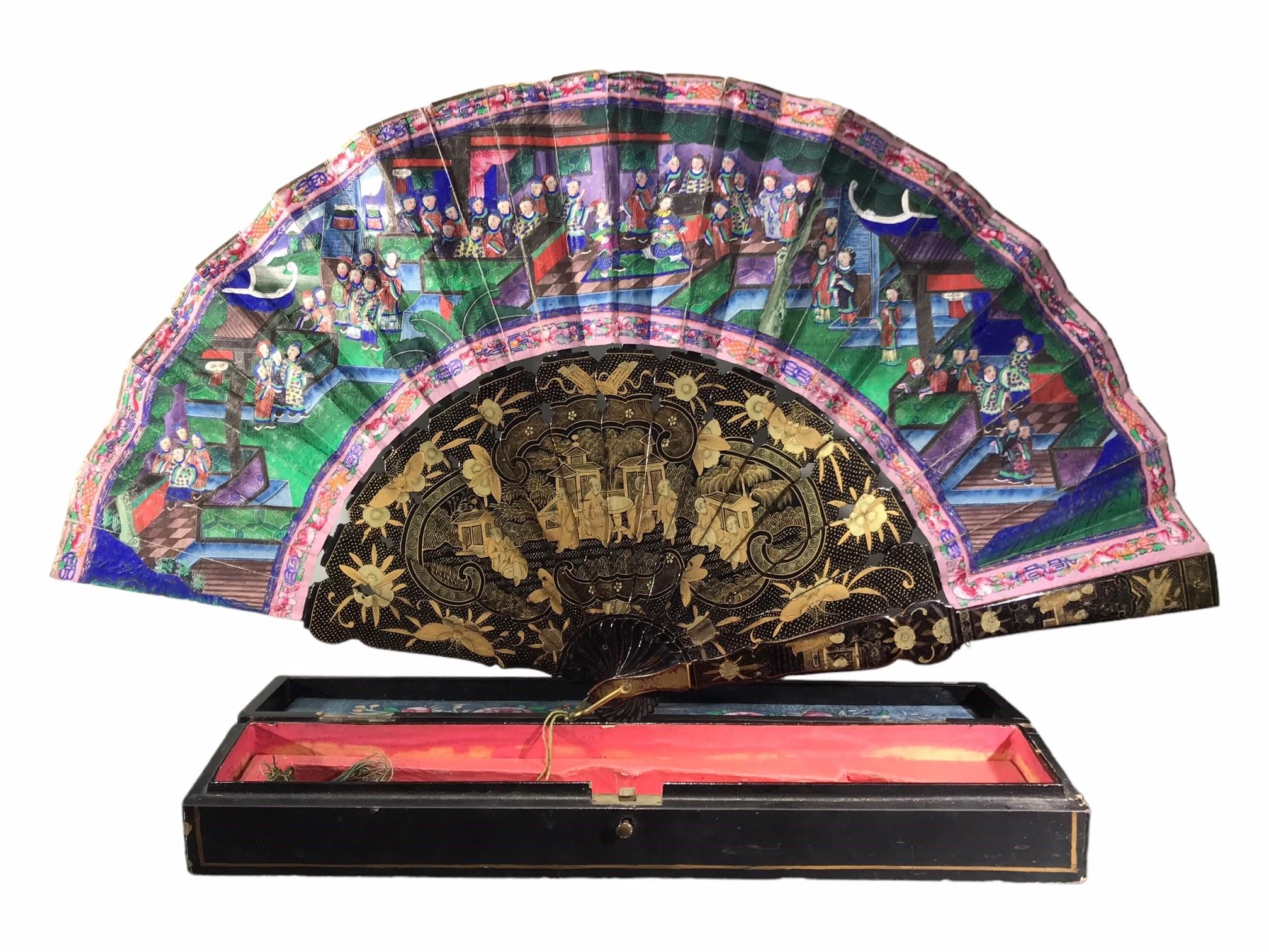 A CHINESE QING DYNASTY DAOGUANG PERIOD PAPER AND LACQUER FAN Painted on both sides decorated with ‘