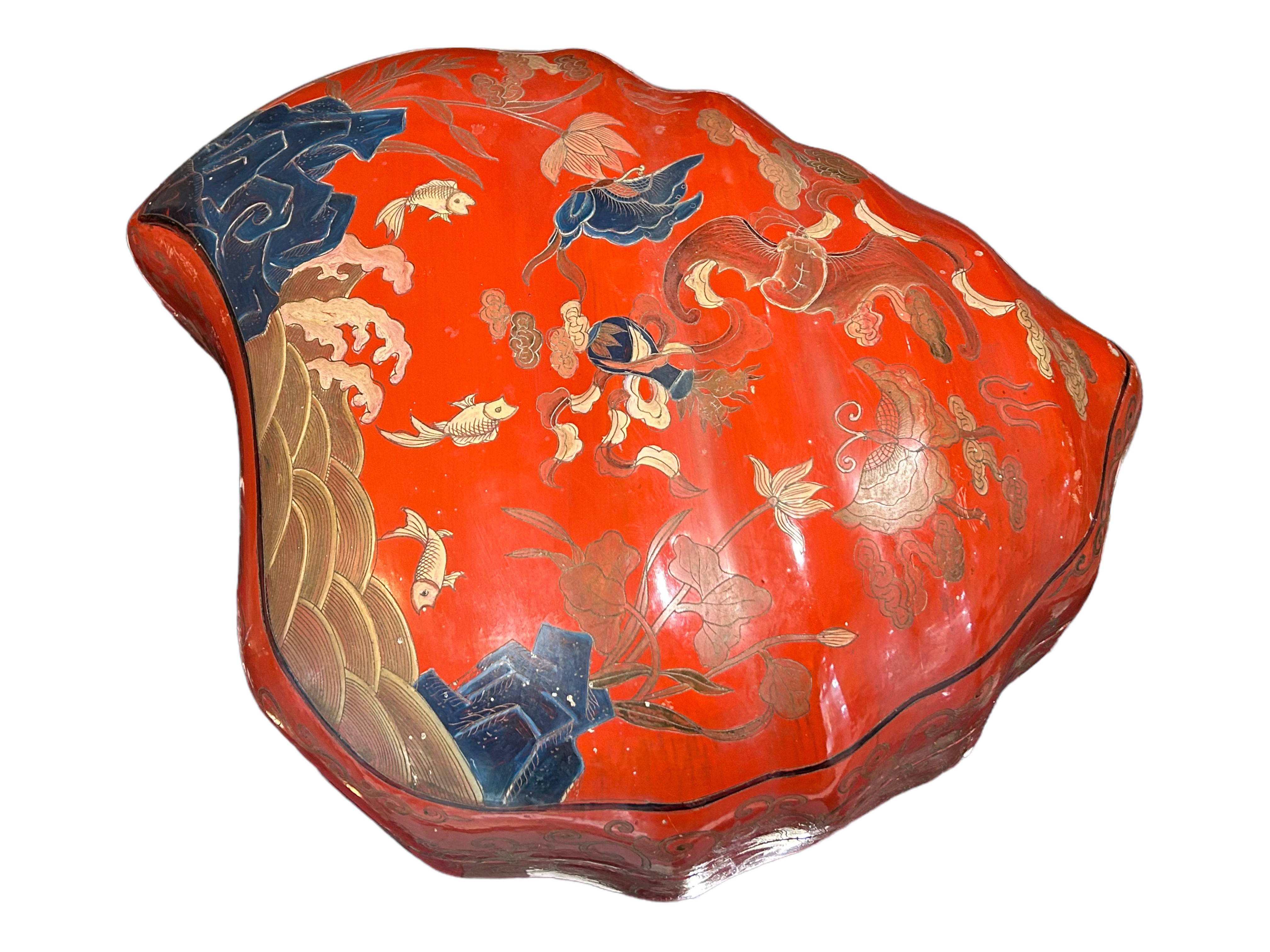 A LARGE LATE 19TH/EARLY 20TH CENTURY JAPANESE LACQUERED SHELL FORM BOX Hand painted with a rocky