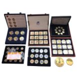 WESTMINSTER & WINDSOR MINT, A COLLECTION OF SIX CASED COMMEMORATIVE COIN SETS AND TWO LARGE GOLD