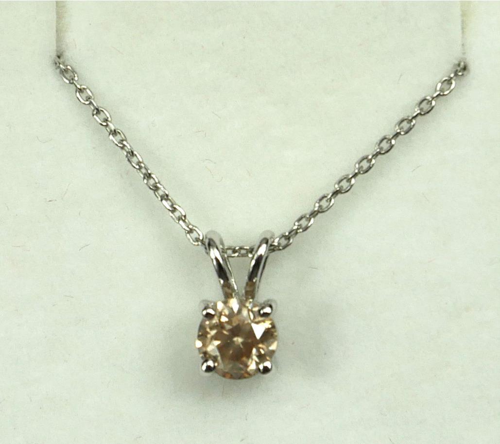 AN 18CT WHITE GOLD SOLITAIRE DIAMOND PENDANT ON A SILVER CHAIN. (Approx Diamond 0.74ct) - Image 2 of 2