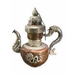 A LATE 19TH/EARLY 20TH CENTURY SINO-TIBETAN TEAPOT Decorated with dragons, mythological creatures