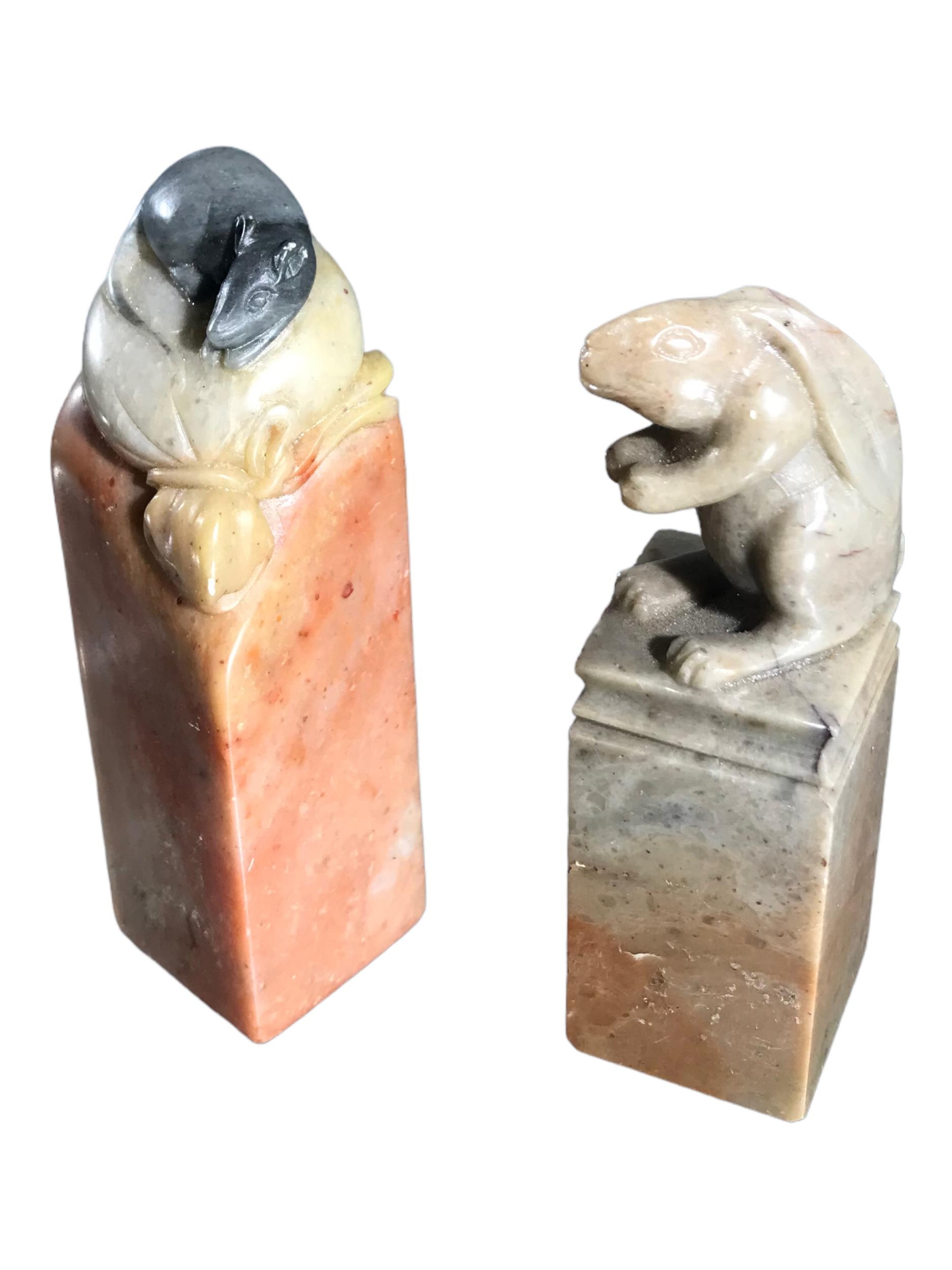 WITHDRAWN TWO CHINESE CARVED SOAPSTONE SEALS HAVING HARE AND RAT FINIALS. (h 8.5cm x w 2.4cm x depth