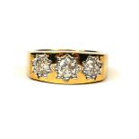 A 9CT YELLOW GOLD GYPSY STAR RING SET WITH DIAMONDS with WGI Certificate (1.06ct).