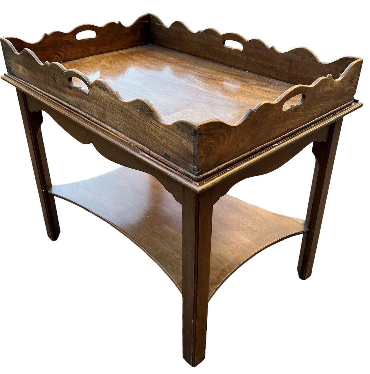 A 19TH CENTURY MAHOGANY BUTLER’S TRAY ON STAND Having shaped sides and pierced handles, raised on - Image 2 of 5