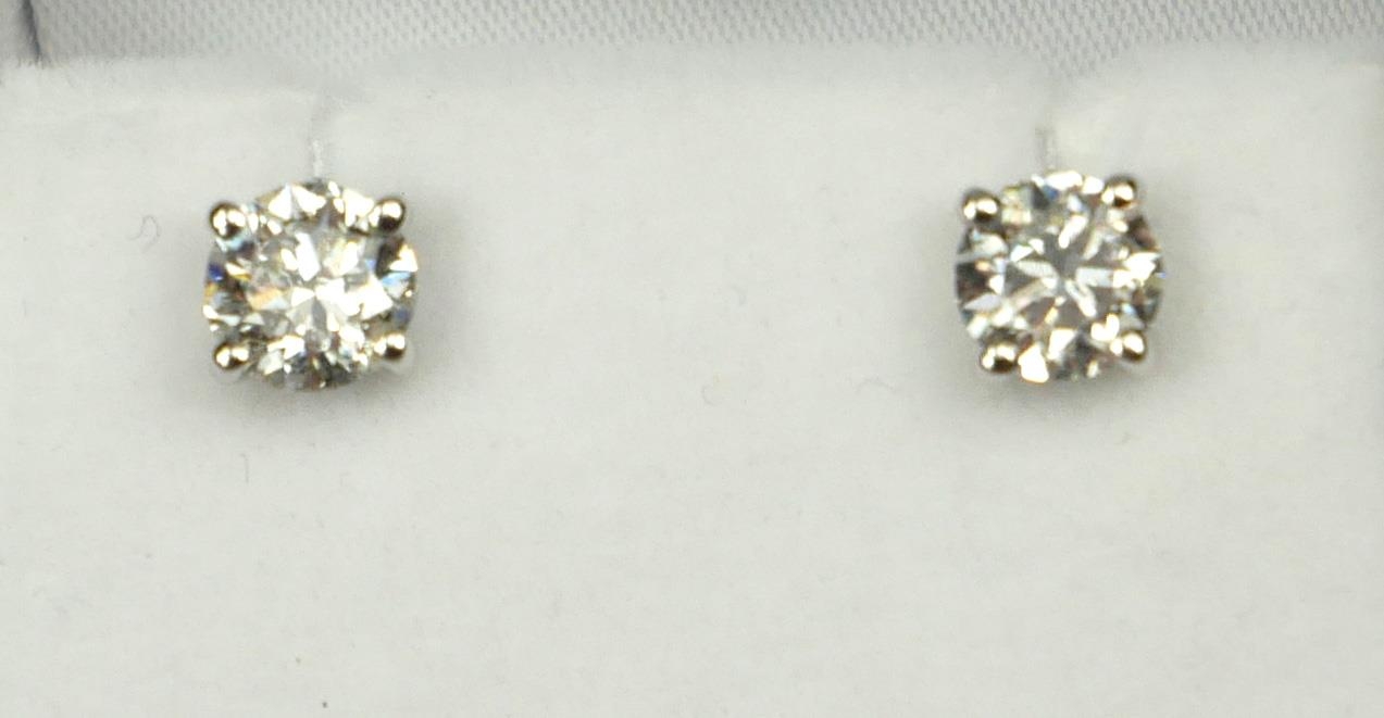 A PAIR OF 18CT WHITE GOLD FOUR CLAW ROUND BRILLIANT CUT DIAMOND SOLITAIRE EARRINGS. (Diamonds approx - Image 2 of 2