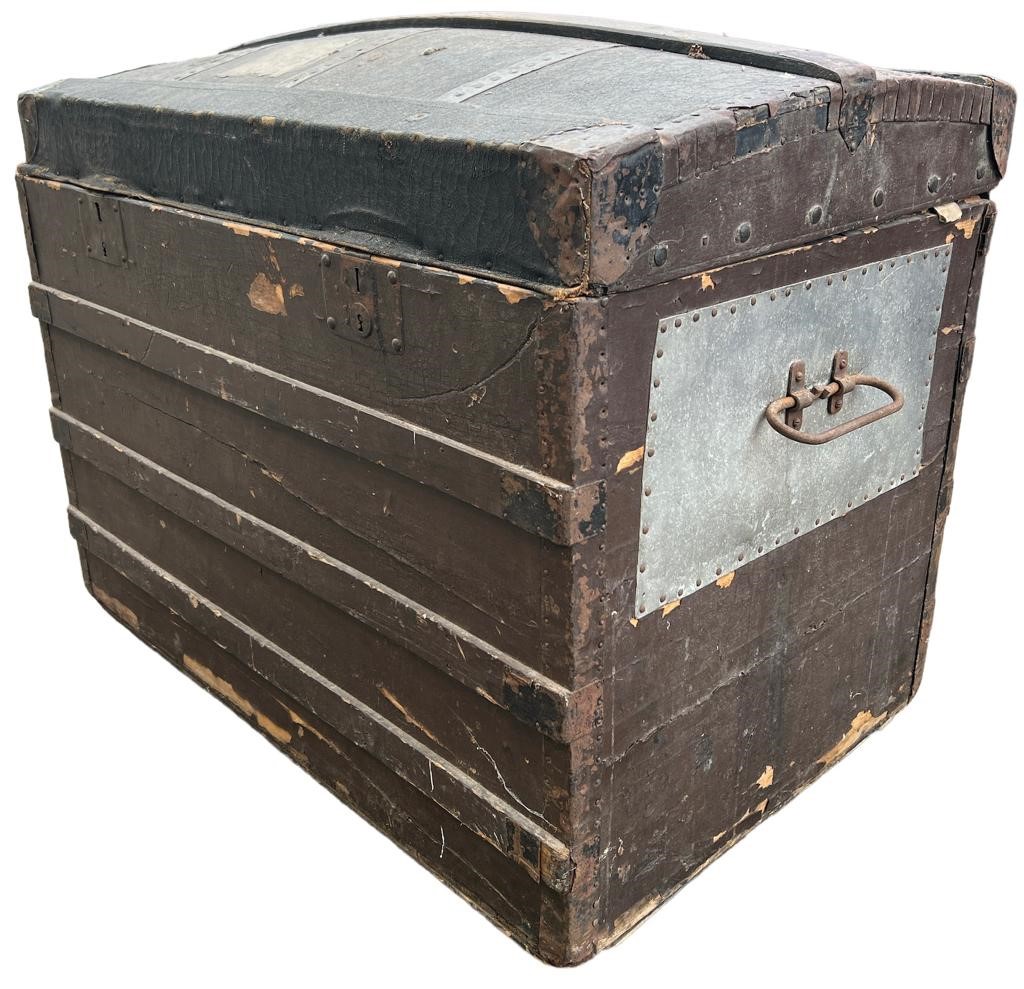 LOUIS VUITTON, A LATE 19TH/EARLY 20TH CENTURY DOMED STEAMER TRUNK Interior bearing label. (h 70cm