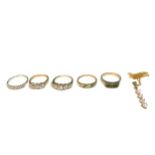 A COLLECTION OF FOUR 9CT GOLD RINGS To include a 9ct gold pendant, a silver ring, a 9ct white gold