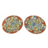 A PAIR OF 18TH/19TH CENTURY JAPANESE ARITA PLATES Decorated with flowers to front and bats to