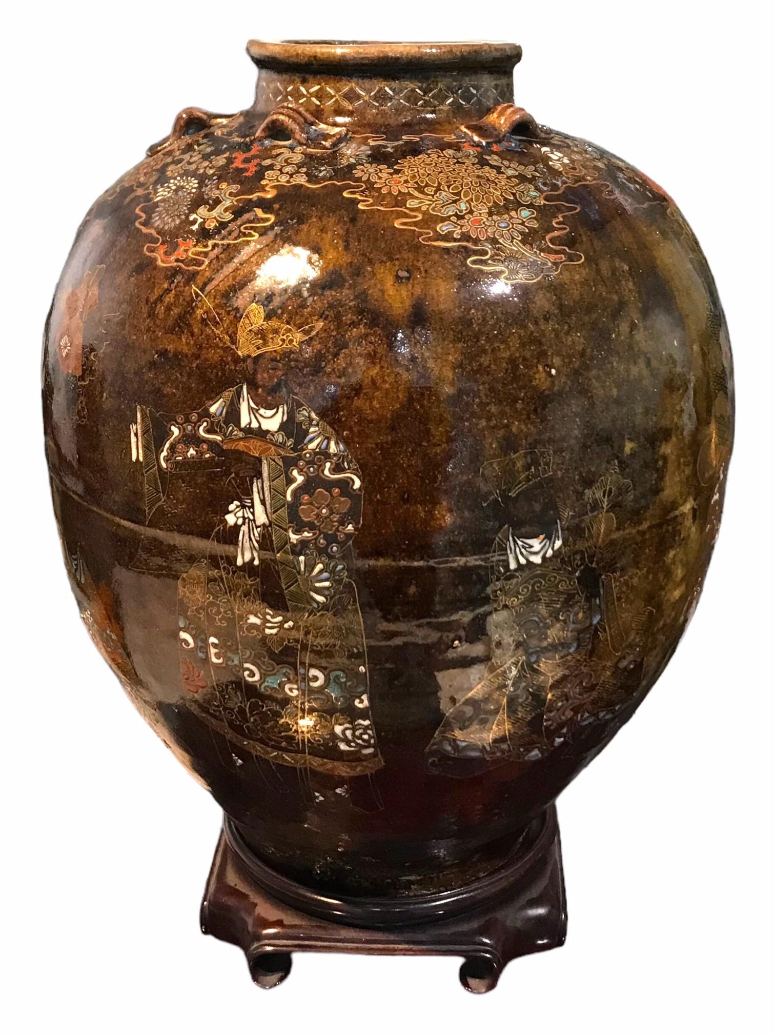 A LARGE AND UNUSUAL 19TH CENTURY ORIENTAL MARTABAN JAR Decorated with painted enamel, gold figures