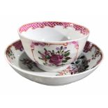 AN 18TH CENTURY CHINESE EXPORT FAMILLE ROSE PORCELAIN TEA BOWL AND SAUCER Decorated with roses and