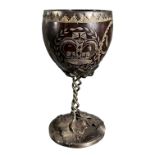 AN ENGLISH POSSIBLY 18TH CENTURY OR LATER COLONIAL WHITE METAL, CARVED COCONUT GOBLET, (TESTED AS