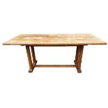 GORDON RUSSELL, A 20TH CENTURY COTSWOLD SCHOOL OAK REFECTORY DINING TABLE The top support on
