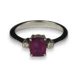 A WHITE METAL, PINK SPINEL AND DIAMOND RING (TESTED AS 18CT WHITE GOLD). (UK ring size N, gross 2.
