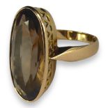 A LARGE FINNISH 14CT GOLD AND SMOKY QUARTZ OVAL RING Hallmarked Turka, 1962. (UK ring size O, 27mm x