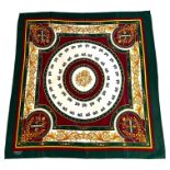 HERMÈS, PARIS, A VINTAGE GREEN, CHARIOT AND CREST THEMED SCARF. (85cm x 85cm)