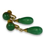 A PAIR OF 14CT GOLD AND GREEN JADE PEAR DROP EARRINGS Having screw backs, cabochon jade upper dangle