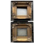 A PAIR OF 19TH CENTURY EBONY AND GILT GESSO FRAMES. (rebate 15.5cm x 18cm, frame 31.5cm x 35cm)