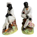 (POSSIBLY THOMAS PARR) STAFFORDSHIRE, A PAIR OF 19TH CENTURY FIGURES OF ‘UNCLE TOM’ AND ‘AUNT