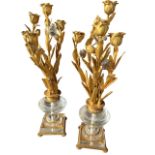 A PAIR OF 19TH CENTURY FRENCH ROCK CRYSTAL AND GILDED BRONZE FOUR BRANCH CANDELABRA the