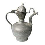 AN 18TH/19TH CENTURY ISLAMIC OTTOMAN METAL EWER (POSSIBLY FROM THE BEYPAZARI REGION). (h 34.7cm x