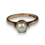 NESTOR WESTERBACK, FINLAND. A 14CT GOLD AND PEARL SOLITAIRE RING, HALLMARKED HELSINKI, 1966. (UK