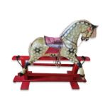 A VINTAGE DAPPLE GREY PAINTED PINE HADDON ROCKING HORSE With real hair mane and tail and leather