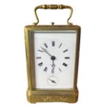 PERT BALLY, PARIS, AN ENGRAVED GILT BRONZE REPEATING ALARM CARRIAGE CLOCK Striking on a bell, the