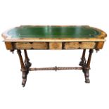 A 19TH CENTURY VICTORIAN GOTHIC REVIVAL WALNUT AND INLAID WRITING TABLE With tooled leather top