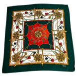 HERMÈS, PARIS, A VINTAGE GREEN AND WHITE LION MEDALLION THEMED SCARF. (90cm x 90cm)