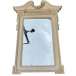 IN THE MANNER OF WILLIAM KENT, AN 18TH/19TH CENTURY MIRROR With egg and dart raised moulded frame