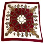 HERMÈS, PARIS, A VINTAGE RED AND WHITE MEDALLION THEMED SCARF. (89cm x 89cm)