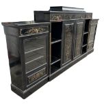 A LARGE 19TH CENTURY EBONISED AESTHETIC MOVEMENT SIDEBOARD With five drawers above panelled doors