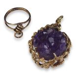 A YELLOW METAL AND AMETHYST GEODE NATURALISTIC PENDANT (TESTED AS 18CT) Together with a yellow metal
