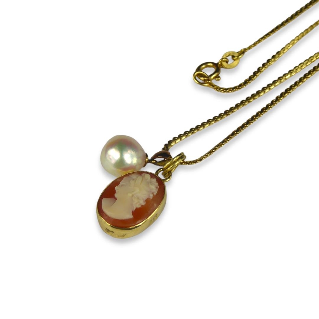 AN 18CT GOLD CHAIN ATTACHED WITH 18CT GOLD CAMEO PENDANT AND 18CT GOLD PEARL PENDANT. (length 27. - Image 3 of 3