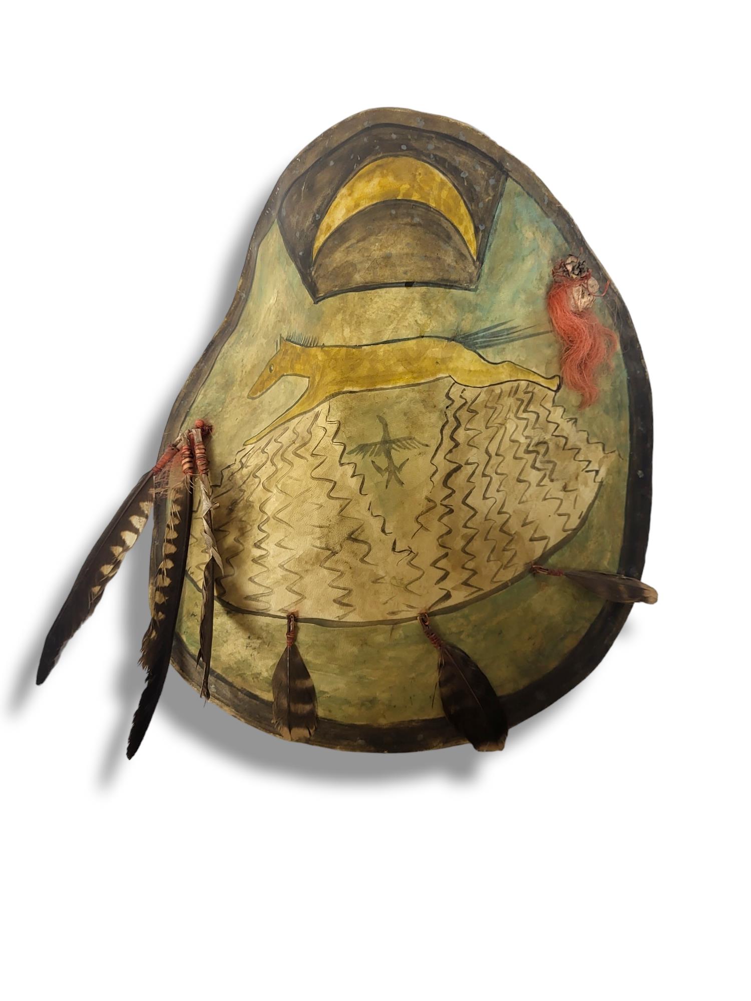 AN ANTIQUE NATIVE AMERICAN INDIAN ANIMAL SKIN 'MANDAN CHIEF' CIRCULAR SHIELD With hand painted