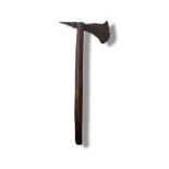 AN ANTIQUE NATIVE AMERICAN INDIAN IRON AND WOOD TOMAHAWK Having an iron axe head and spike and