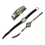 GUCCI, TWO VINTAGE STAINLESS STEEL LADIES’ WRISTWATCHES Bangle form watch with diamante 'G',