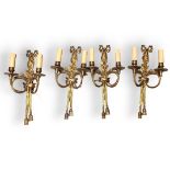 AN EARLY 20TH CENTURY SET OF FOUR LOUIS XVI STYLE PATINATED BRONZE AND ORMOLU TWO BRANCH WALL