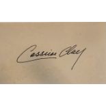 CASSIUS CLAY (MUHAMMAD ALI), AN ORIGINAL PEN ON CARD AUTOGRAPH Hand signed in The Olympic Year of