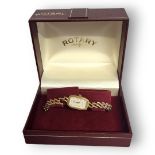 ROTARY, A VINTAGE 9CT GOLD LADIES’ WRISTWATCH Having a rectangular white dial and gilt number