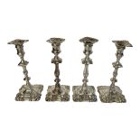 WILLIAM CAFE, A PAIR OF GEORGIAN SILVER CANDLESTICKS Having knopped pillars and the base having