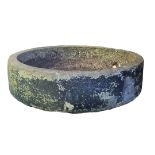 A 19TH CENTURY WEATHERED RUSTIC RECONSTITUTED STONE CIDER PRESS. (h 18cm x diameter 73cm) Condition: