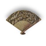IN THE MANNER OF WANG HING, A CHINESE WHITE METAL FAN FORM BROOCH With raised landscape scene. (