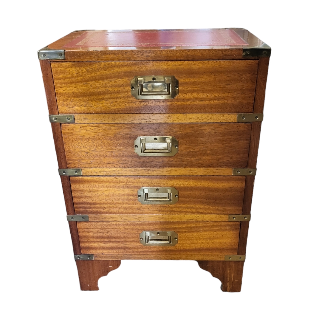 A MILITARY STYLE MAHOGANY PEDESTAL CHEST With tooled leather top brass fittings, drawers. (42cm x