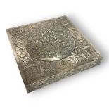 A LATE 19TH CENTURY SQUARE PERSIAN WHITE METAL/SILVER CIGAR BOX AND COVER Centrally embossed with