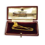 A VINTAGE 9CT GOLD AND RUBY 'FOX HEAD' STICK PIN Having round cut ruby set eyes and fine engraved