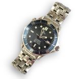 OMEGA, SEAMASTER, A STAINLESS STEEL GENT’S WRISTWATCH Having a marine blue enamel bezel and textured