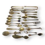 A COLLECTION OF GEORGIAN SILVER AND LATER FLATWARE To include two sugar tongs caddy spoon,